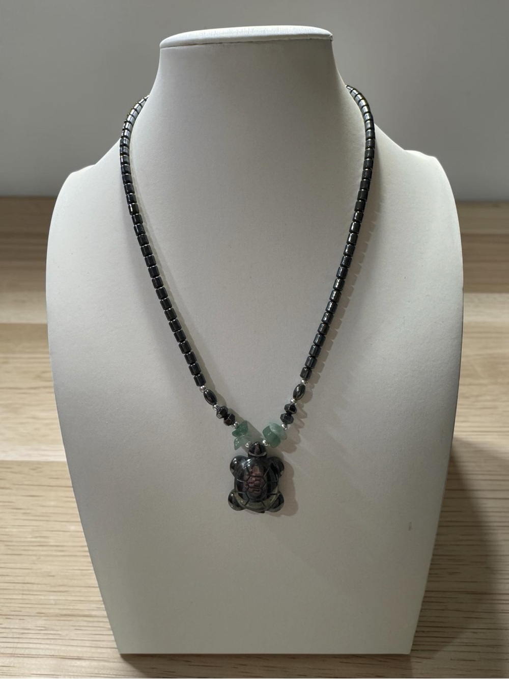 Black Hematite Beaded Necklace with Carved Hematite Turtle Pendant